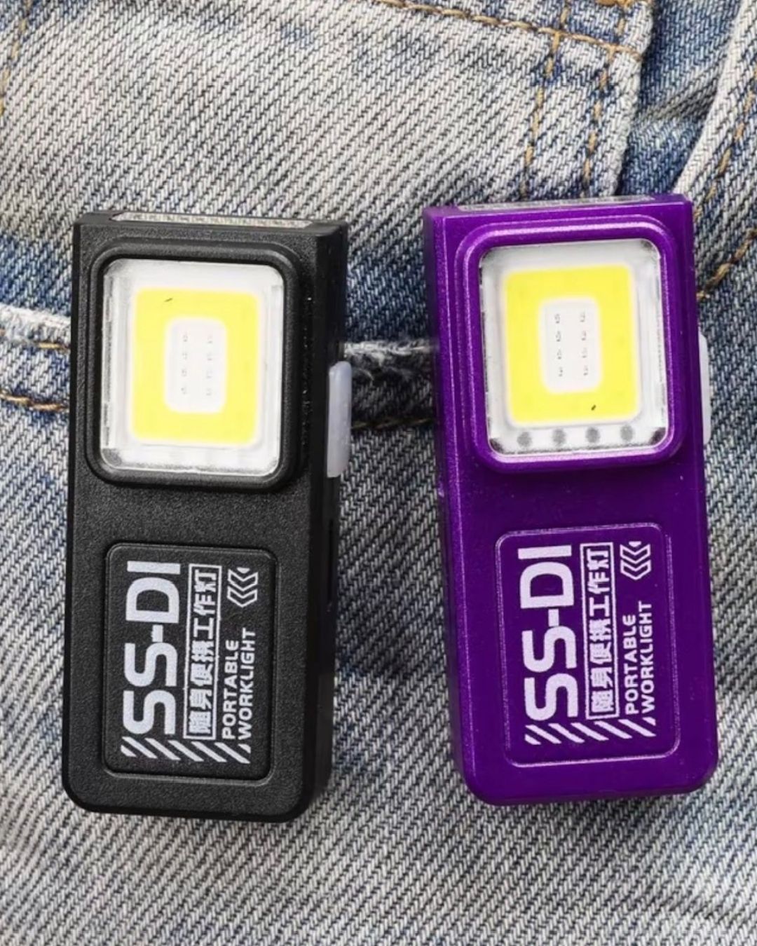Vellcom™ Mini Clip-On COB Rechargeable Light clipped to a jeans pocket